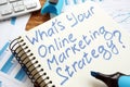 WhatÃ¢â¬â¢s Your Online Marketing Strategy? Book and keyboard Royalty Free Stock Photo